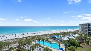 A resort with a pool, beach, and ocean view. - C602 Sunset View, 3 Pools, Gulf Front (Panama City)