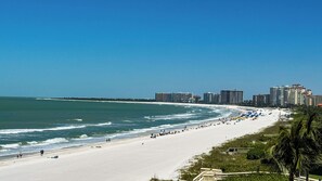 On the beach, sun loungers, beach towels - Sea Winds 601: Beach Front, Pool View (Marco Island)
