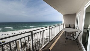 A balcony with a view of the beach and ocean. - D504 Gulf Front Views, 3 pools, Tennis (Panama City Beach)