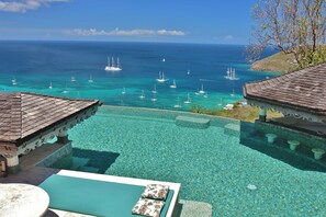Outdoor pool, a heated pool, sun loungers