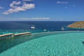 Outdoor pool, a heated pool, sun loungers