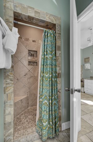 Combined shower/tub, hair dryer, towels, soap