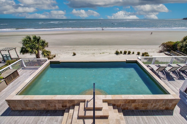 Private pool with panoramic ocean views.