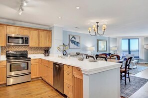 Fridge, microwave, oven, stovetop - 504 Summerhouse by AvantStay | Ocean Front Condo w/ Community Pool Access (isle of Palms)