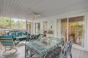 Screened porch for outdoor living.