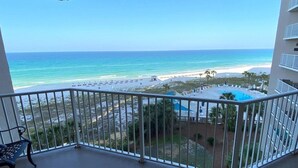 A balcony with a view of the beach and ocean. - E604 Amazing Gulf View, 3 Pools, 2 FREE Beach Chairs! (Panama City Beach)