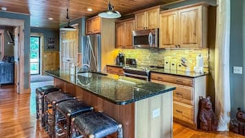 Dishwasher, coffee/tea maker, cookware/dishes/utensils