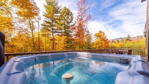 A hot tub surrounded by autumn trees. - Beautiful Home, Views, Near Whiteface, Lake Placid (Wilmington)
