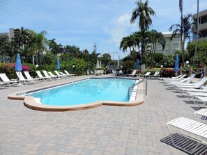 Outdoor pool, a heated pool - Beach Club 412: 1 Bedroom Condo w/private beach access (Marco Island)