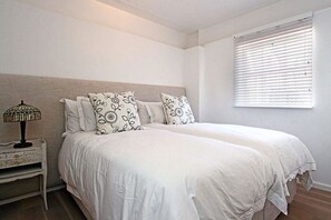 Apartamento | 2 quartos, roupas de cama premium, escrivaninha, cortinas blackout