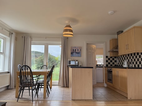 Dishwasher, cookware/dishes/utensils. In the center of Doolin Village