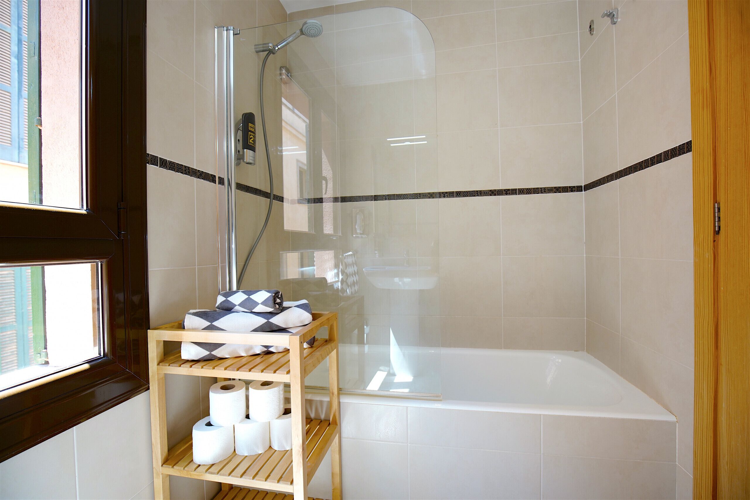 Shower, eco-friendly toiletries, hair dryer, towels