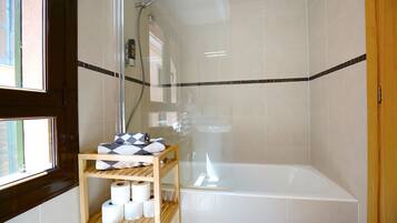 Shower, eco-friendly toiletries, hair dryer, towels