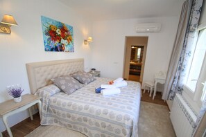 4 slaapkamers, een strijkplank/strijkijzer, gratis wifi, beddengoed