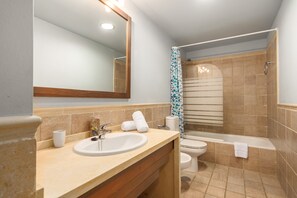 Bathtub, hair dryer, towels