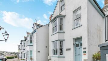 Rows of charming homes with bay windows and small front gardens.