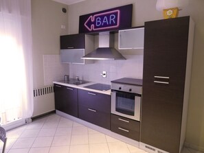 Apartment, 1 Bedroom | Private kitchen | Full-size fridge, microwave, oven, stovetop