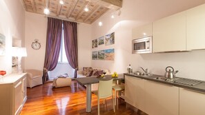 Fridge, stovetop, coffee/tea maker, toaster