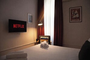 1 chambre, fer et planche à repasser, accès au Wi-Fi (inclus)
