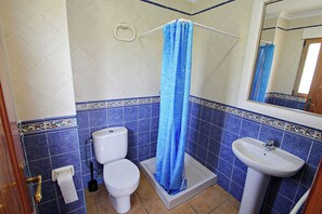 Bathtub, hair dryer, towels