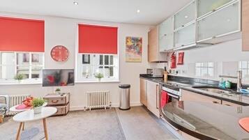 Fridge, microwave, toaster, cookware/dishes/utensils