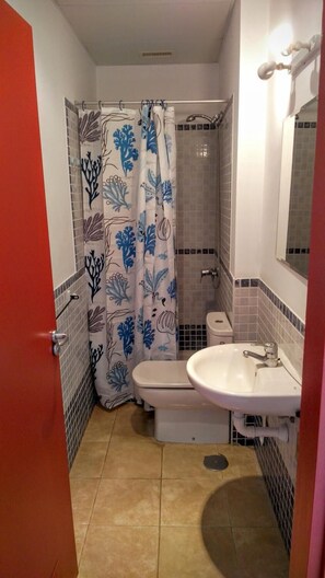 Bathtub, hair dryer, towels