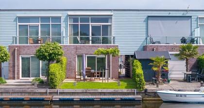 Hübsches Inselhaus mit schöner Aussicht und herrlicher Dachterrasse.