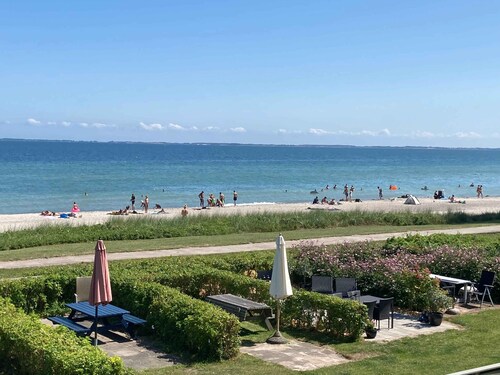 Only 50 meters to the beach. Enjoy being awakened by gentle waves.