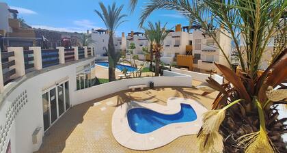 LM5 - Appartement avec jardin privé et piscine à Vera Playa