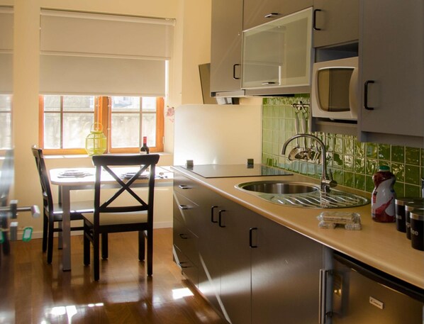 Fridge, microwave, coffee/tea maker, toaster