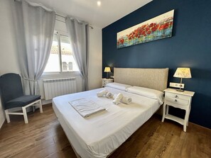 4 chambres, coffres-forts dans les chambres, fer et planche à repasser