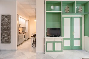 Enjoy cooking in this well-equipped kitchen with oven, microwave, and sink.