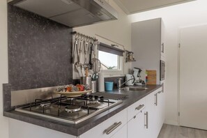 Refrigerador, microondas, parrilla de estufa y lavavajillas 