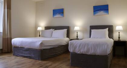 Doolin Village L06 - a two-story lodge that sleeps 6 guests in 3 bedrooms