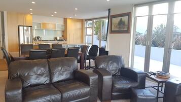 Apartment, 3 Bedrooms | Living area | Flat-screen TV