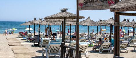 Sun-loungers, beach towels