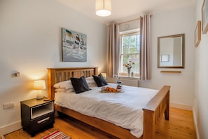 2 dormitorios, tabla de planchar con plancha, wifi gratis y ropa de cama