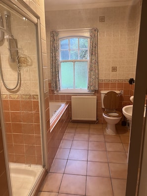 Bathtub, hair dryer, towels