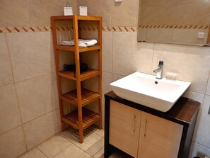 Bathtub, hair dryer, towels