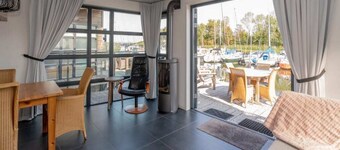 Relaxing on the terrace, unwinding in the sauna, or having drinks by the gas hearth; this water vill