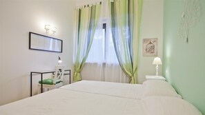 2 habitaciones, tabla de planchar con plancha, internet y ropa de cama 