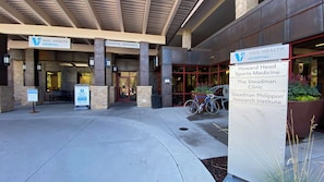 Vail Health Hospital features a modern entrance with a covered area and convenient valet parking.