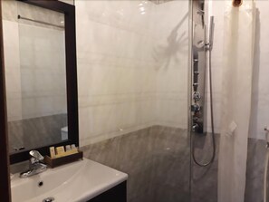 Free toiletries, hair dryer, slippers, towels