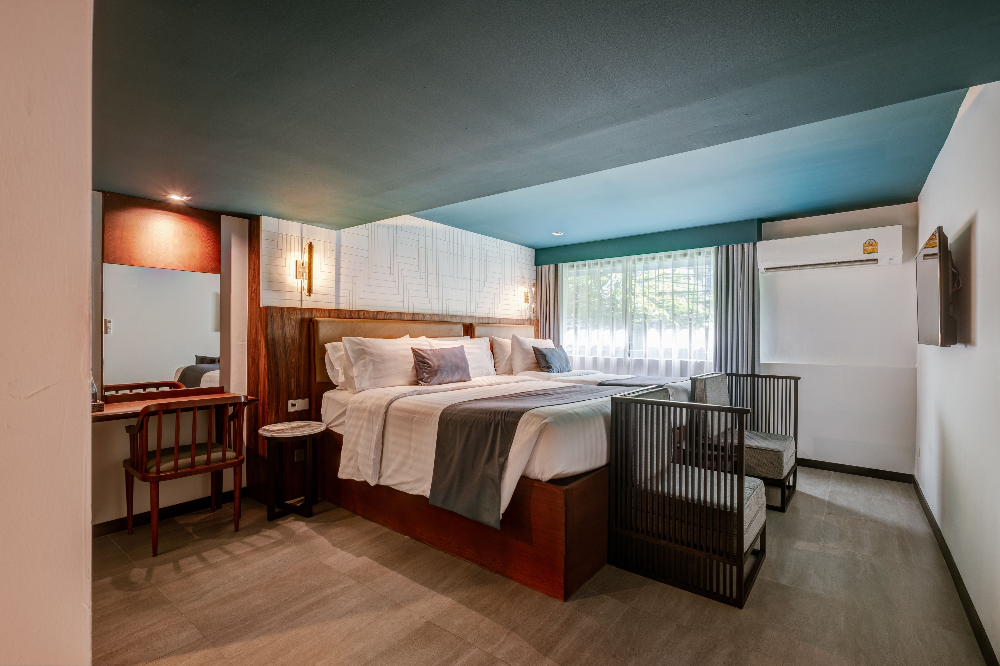 premier triple room | minibar, in-room safe, desk, blackout curtains