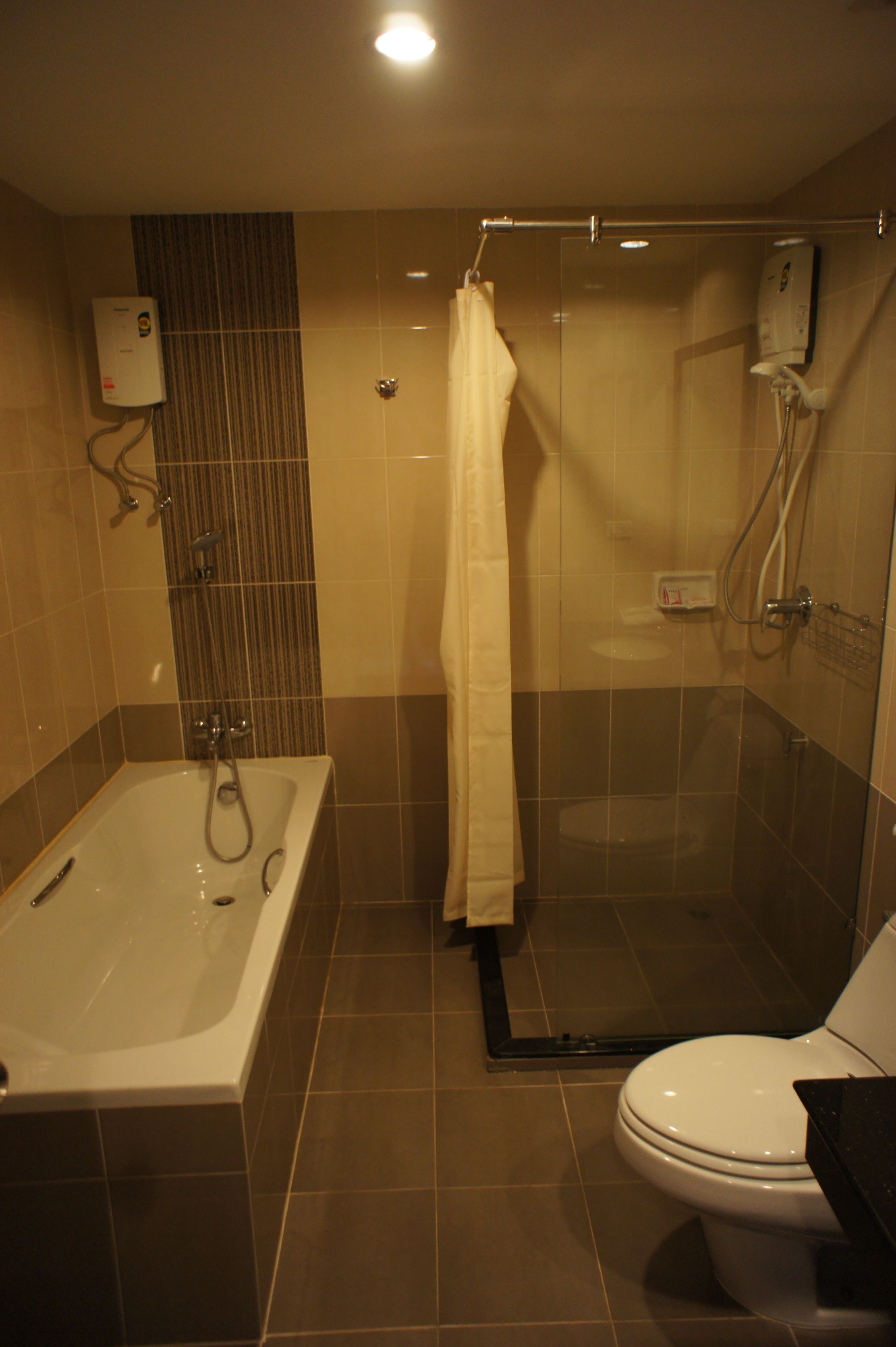 deluxe room with bathtub  | bathroom | free toiletries, towels