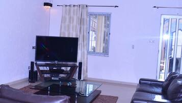Superior Double Room | Living area | Plasma TV