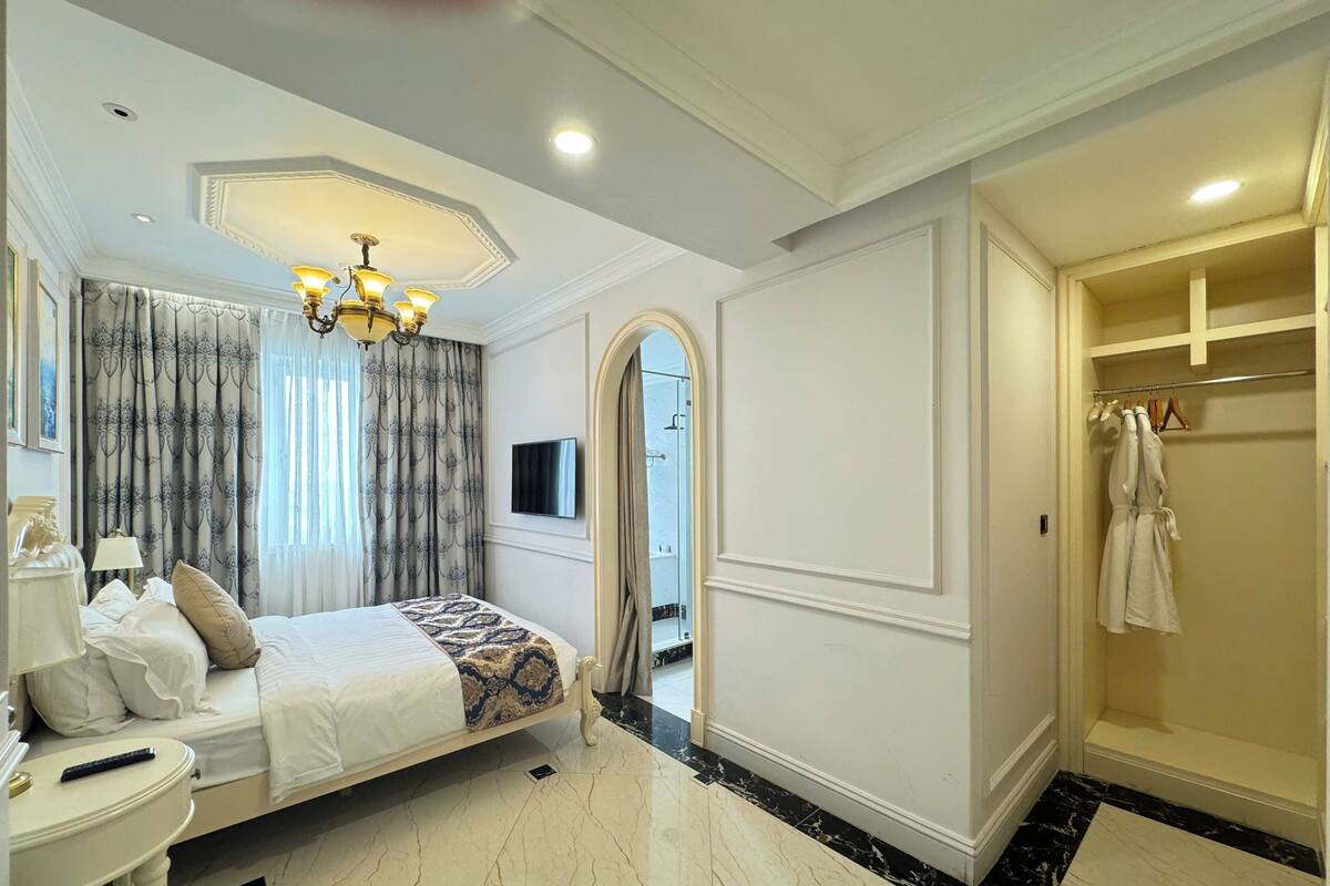 ห้องแฟมิลี่สวีท, 2 ห้องนอน, วิวสวน | มินิบาร์, ตู้นิรภัยในห้องพัก, โต๊ะทำงาน, ผ้าม่านกันแสง