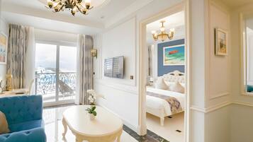 Grand Suite, Ocean View | Living area | 41-inch LCD TV with cable channels, TV