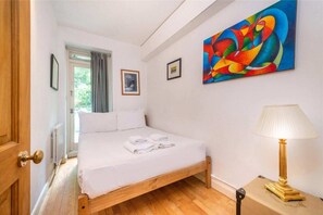 Apartment, 2 Bedrooms | 2 bedrooms, premium bedding, laptop workspace, iron/ironing board
