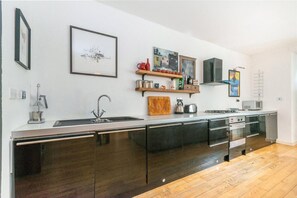Apartment, 2 Bedrooms | Private kitchen | Fridge, microwave, oven, stovetop